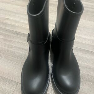 Black Rubber Jeffrey Campbell rain boots.